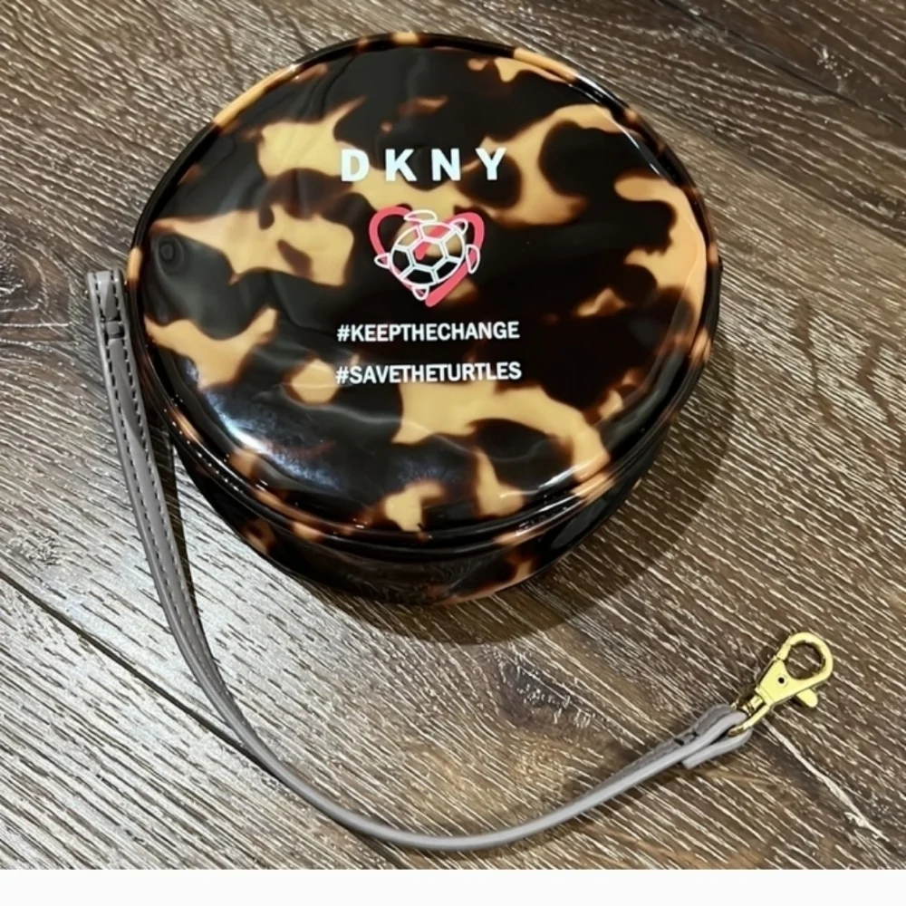 DKNY save the turtle wristlet in excellent condition